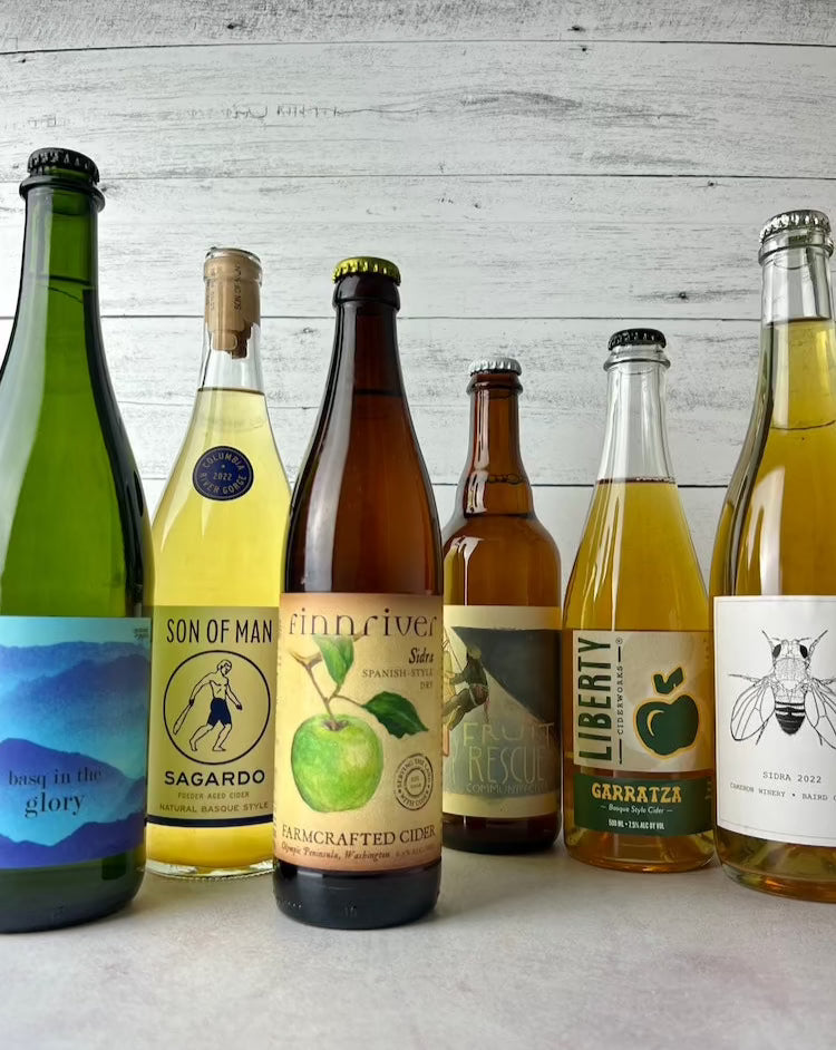 6 bottles of cider: Botanist & Barrel Basq in the Glory, Son of Man Sagardo, Finnriver Sidra, Barman Cellars Fruit Rescue, Liberty Garratza, Cameron Winery Sidra 2022