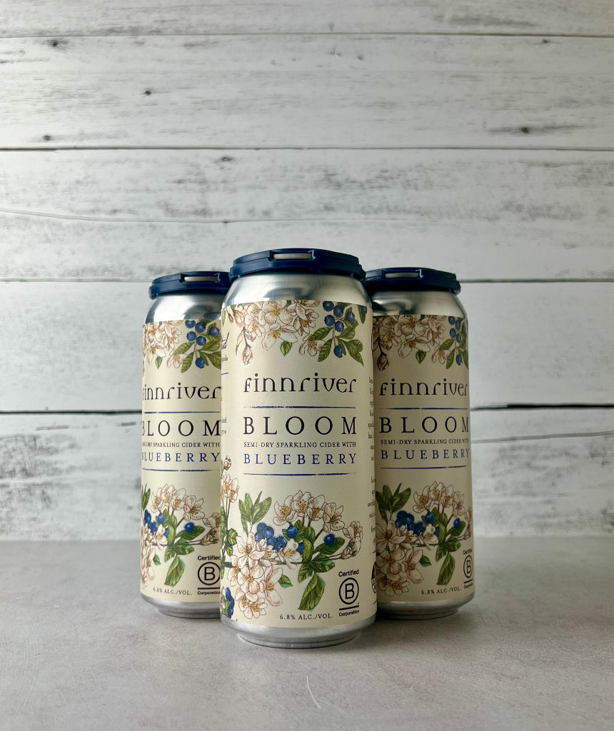 4-pack of 16 oz cans of Finnriver Bloom - Semi-Dry Sparkling Cider with Blueberry