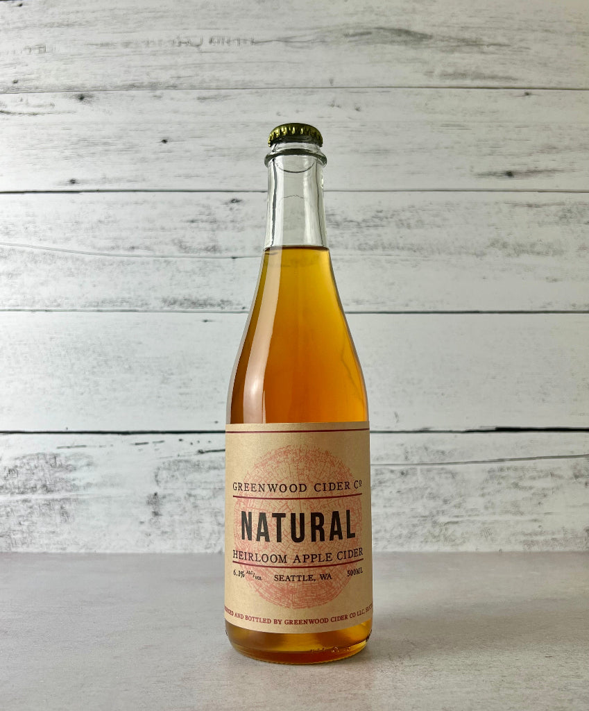 Photo of a 500 mL bottle of Greenwood Cider Co. Natural Heirloom Cider