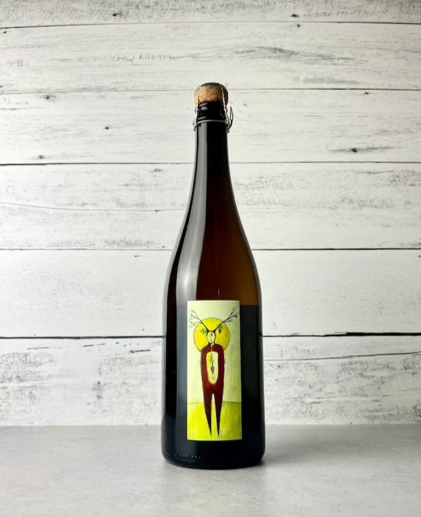 750 mL bottle of South Hill Cider Bacchus cider coferement of Golden Russet and Gewurztraminer skins