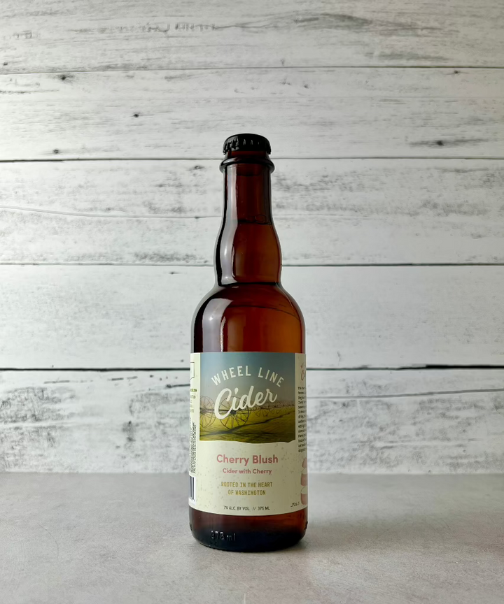 375 mL bottle of Wheel Line Cider Cherry Blush - Cider with Cherry - Rooted in the Heart of Washington