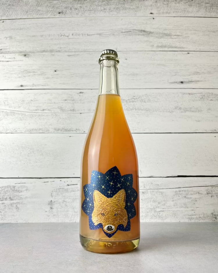 750 mL bottle of Art + Science Twilight Perry. Label depicts the face of a fox with a dark blue starry background