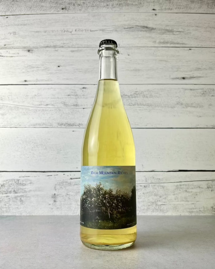 750 mL bottle of Botanist & Barrel Rich Mountain Riches Pet Nat Cider
