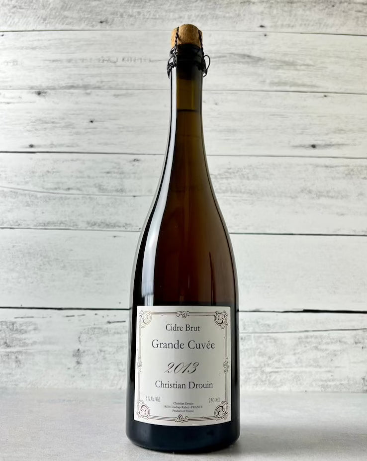 750 mL bottle of Christian Drouin Cidre Brut Grande Cuvee 2013 with cork and cage