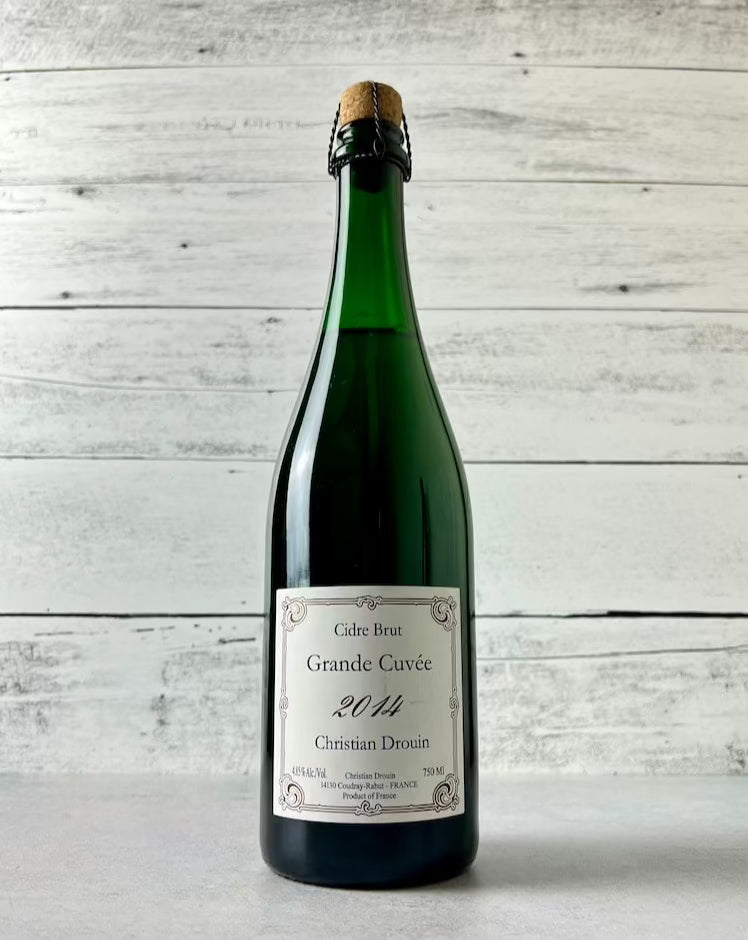 750 mL bottle of Christian Drouin Cidre Brut Grande Cuvee 2014 with cork and cage top