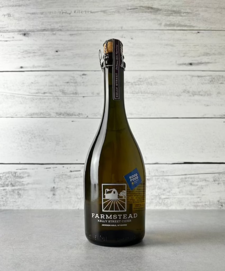 500 mL bottle of Farmstead Kelly Street Cider with blue Good Food Award sticker