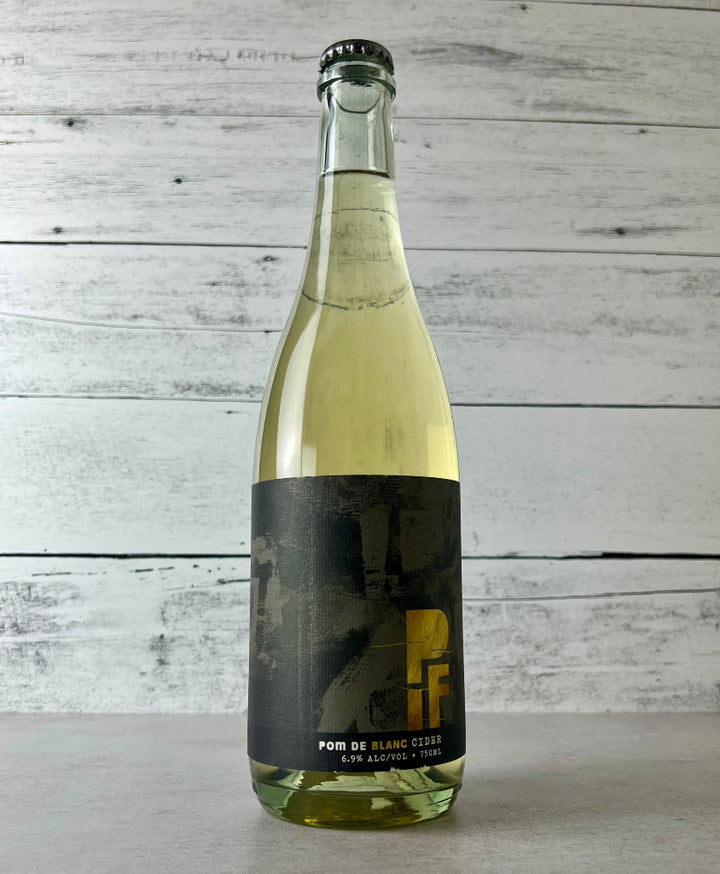 Photo of a 750 mL bottle of Presque Isle Farm (PIF) Cider - Pom De Blanc Cider