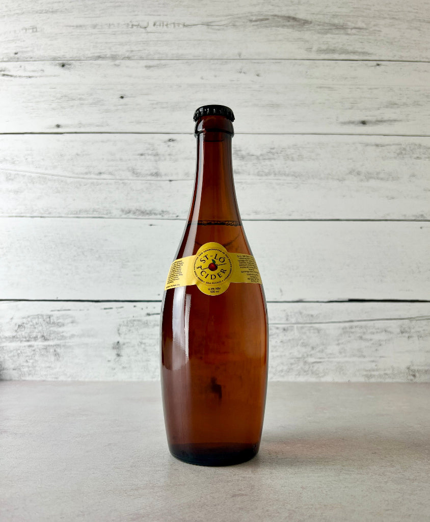 Photo of a 500 mL amber bottle of St-Lô Cider - 1066 Blend 