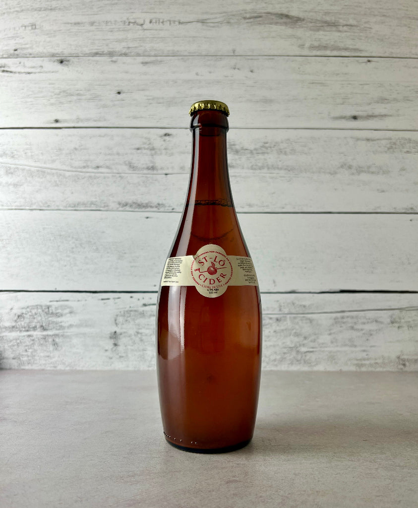 Photo of a 500 mL amber glass bottle of St-Lô Cider - Cidre De L'ille