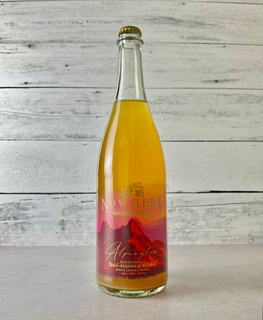 Photo of a 750 mL bottle of dry-hopped apple juice by Nowhere | Reserve Edition | Alpenglow | Apple | Hops | Honey - non-alcoholic