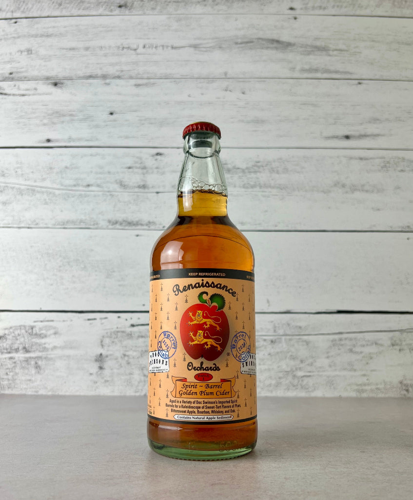 Photo of a 500 mL Bottle of Renaissance Cider with a white wooden background