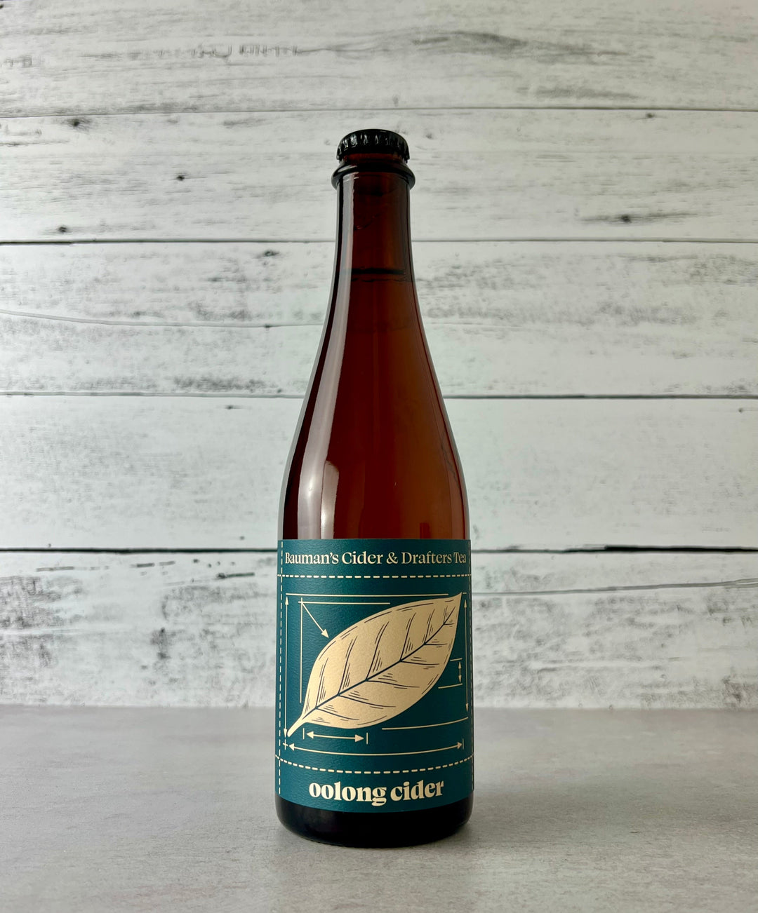 photo of a 500 mL bottle of Bauman's Cider Drafters Tea Oolong Cider 