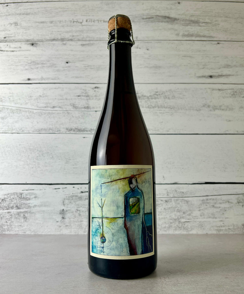 Photo of a 750 mL bottle of South Hill Cider Geneva Jersey cider with an art label of a painting in blue and yellow tones
