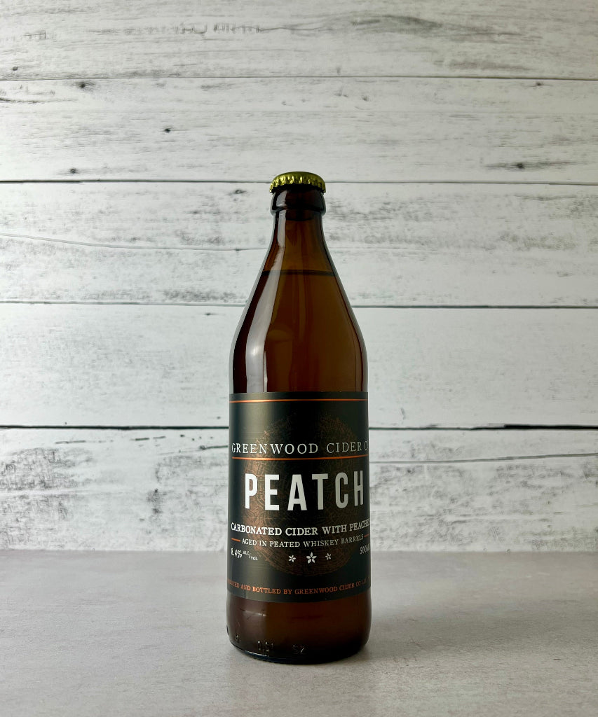 Photo of a 500 mL bottle of Greenwood Cider Peatch - Carbonated Cider with Peaches
