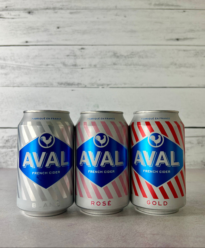 Three cans of Aval French Cider 