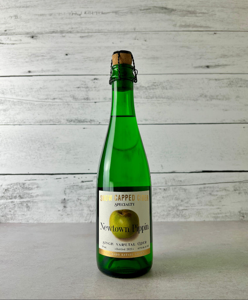 Photo of a 375 mL bottle of Snow Capped Cider - Specialty - Newtown Pippin Single Varietal Cider