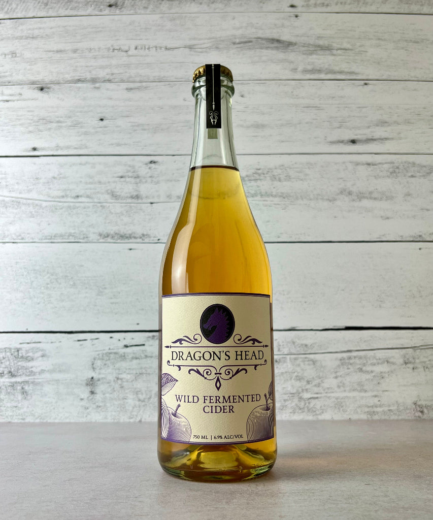 Photo of a 750 mL bottle of Dragon's Head Wild Fermented Cider