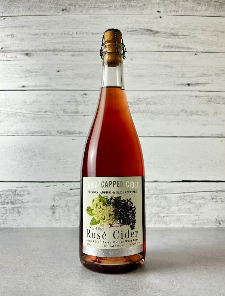 750 mL bottle of Snow Capped Cider - Pinova Apples & Elderberries - Sparkling Rosé Cider - Aged 9 Months on Malbec Wine Lees 