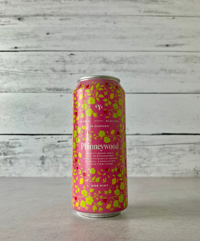 16 oz can of Yonder Phinneywood Cider with a bright pink with green floral graphic 