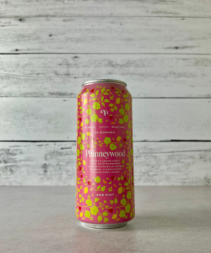 16 oz can of Yonder Phinneywood Cider with a bright pink with green floral graphic 