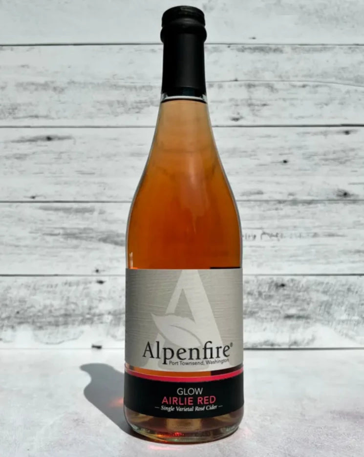 750 mL clear glass bottle of pink-hued Alpenfire Glow Airlie Red Single Varietal Rosé Cider
