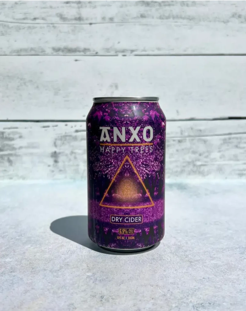 12 oz can of Anxo Happy Trees Dry Cider