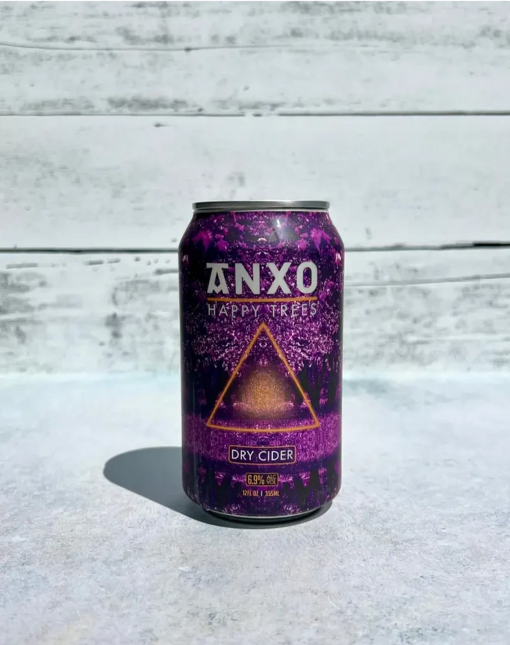 12 oz can of Anxo Happy Trees Dry Cider