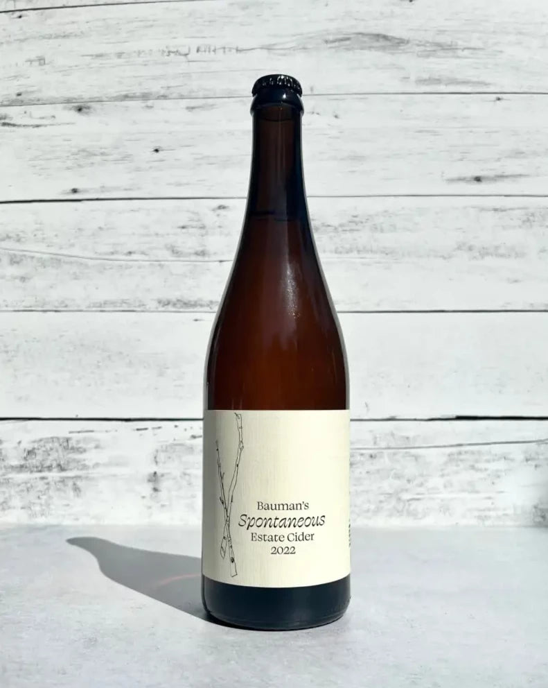 750 mL bottle of Bauman's Estate Spontaneous Cider 2022