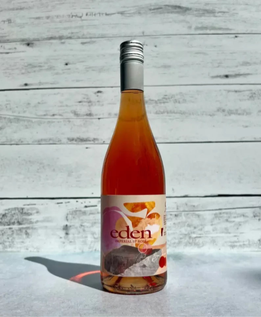 750 mL bottle of pink-hued Eden Cider Imperial 11 degree Rosé Cider