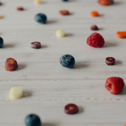 various berries spread out on a table top