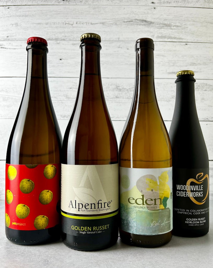 4 bottles of single varietal Golden Russet Cider, including Pet Project, Alpenfire, Eden, and Empyrical