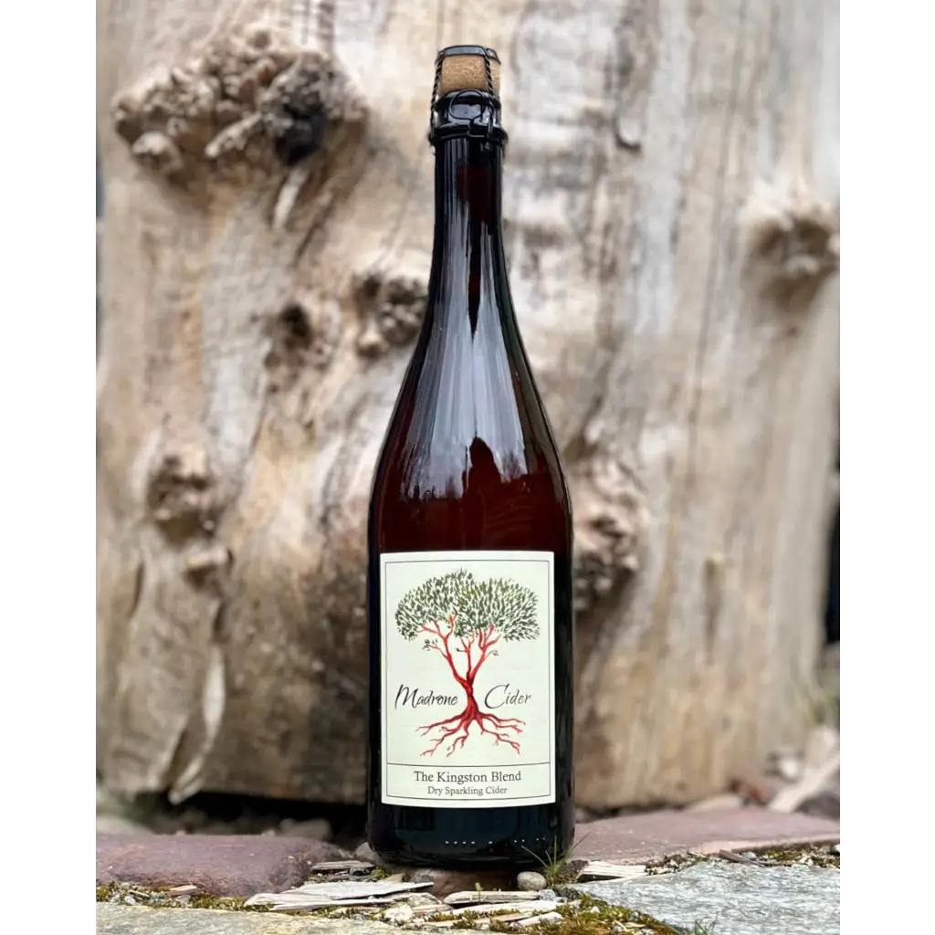 Madrone Cider The Kingston Blend cider in a brown bottle with cork and cage