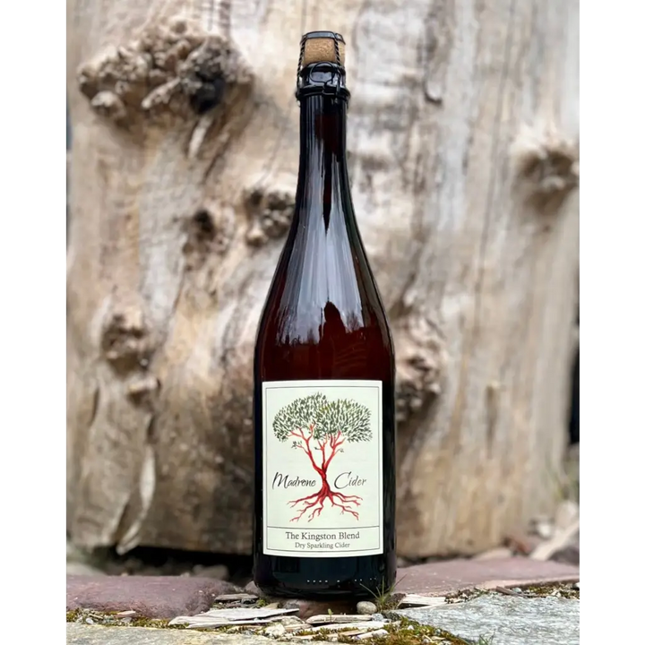 Madrone Cider The Kingston Blend cider in a brown bottle with cork and cage